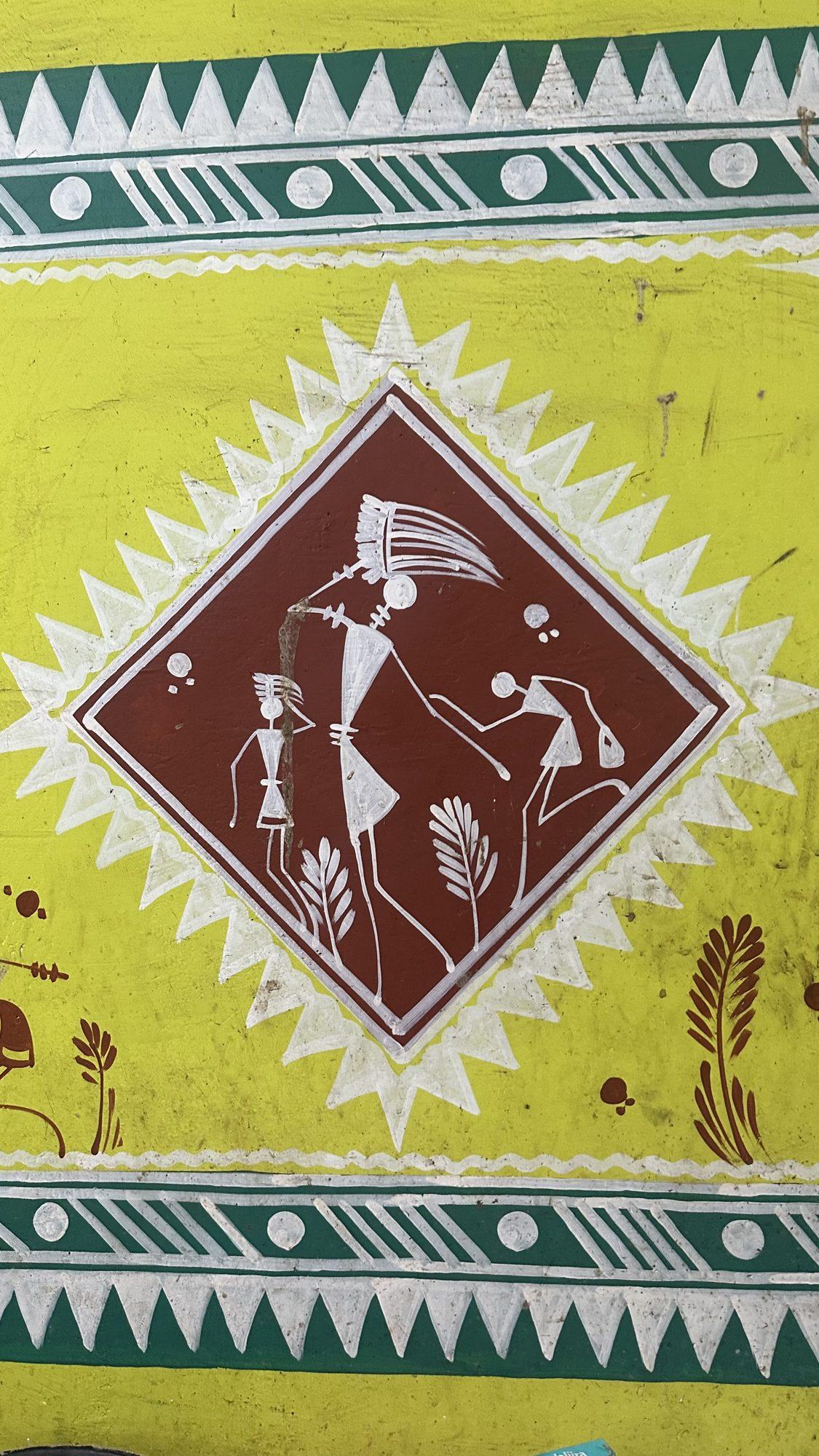 Folk-art wall painting of a flute player in a diamond frame